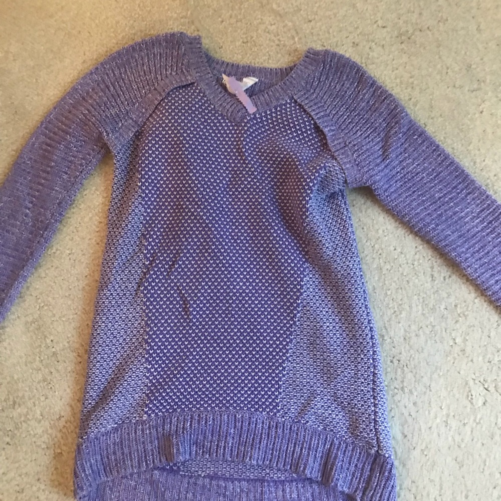 purple and white ivivva sweater